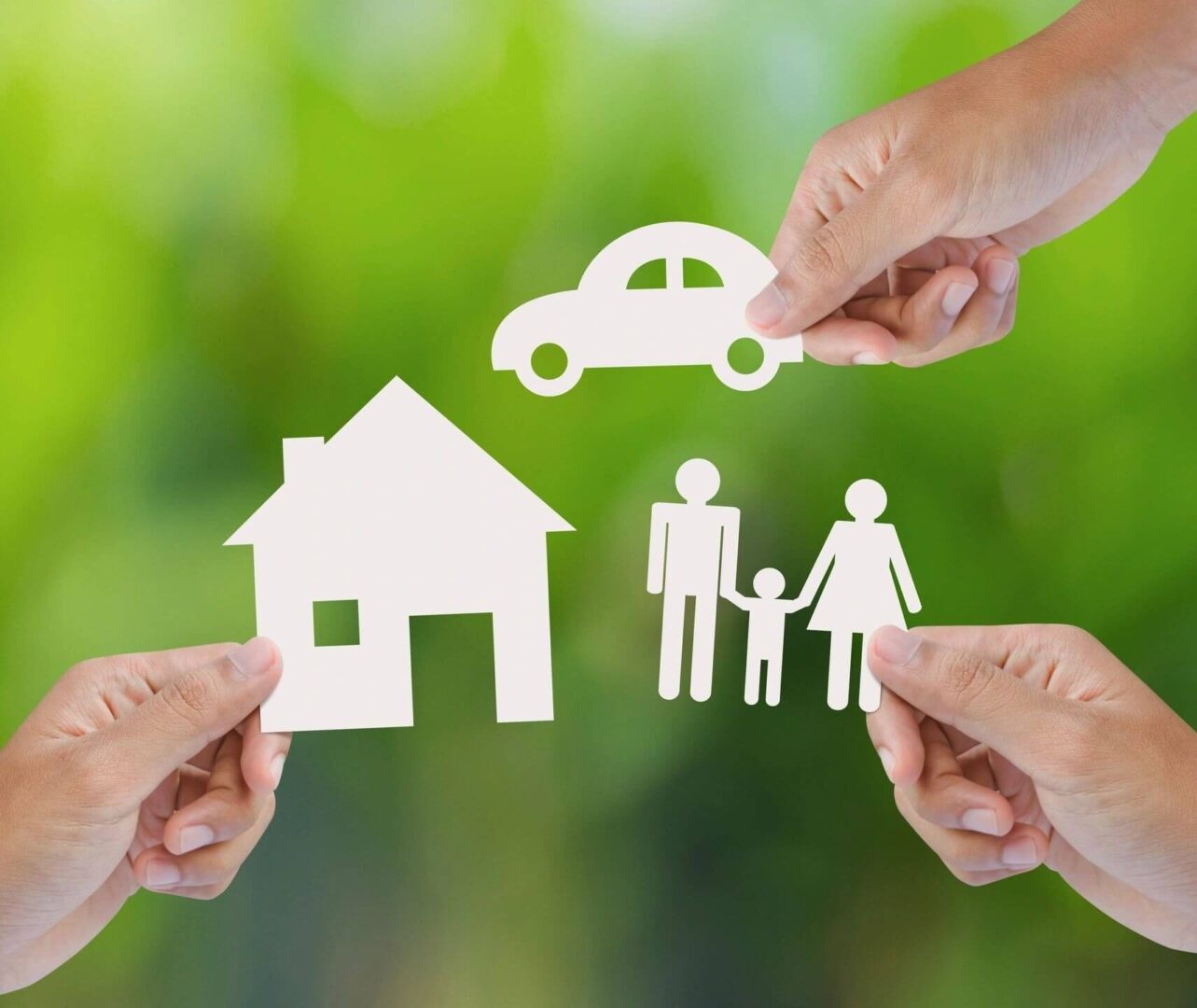 Hands Holding Paper House, Car and Family